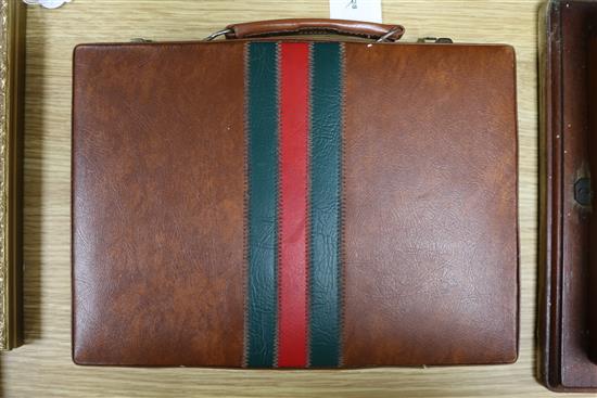 A vintage Gucci leather-covered backgammon set